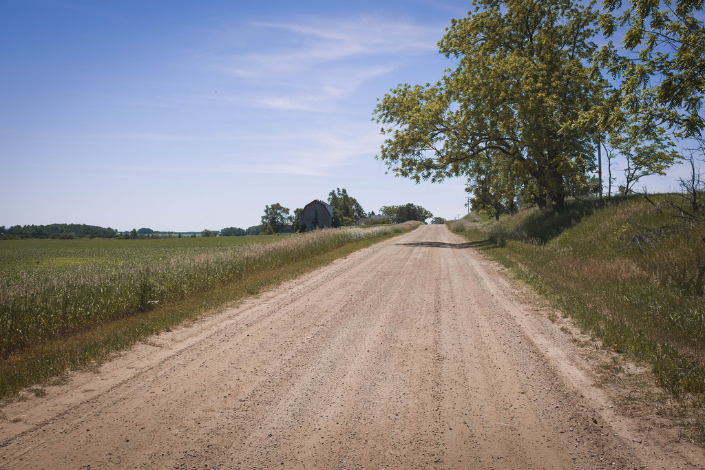 dirt-road-barn-sun